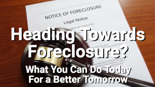 Foreclosure papers with gavel on table