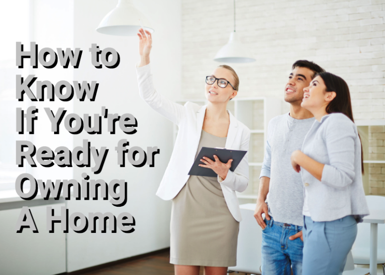 Young couple looking at home with real estate agent