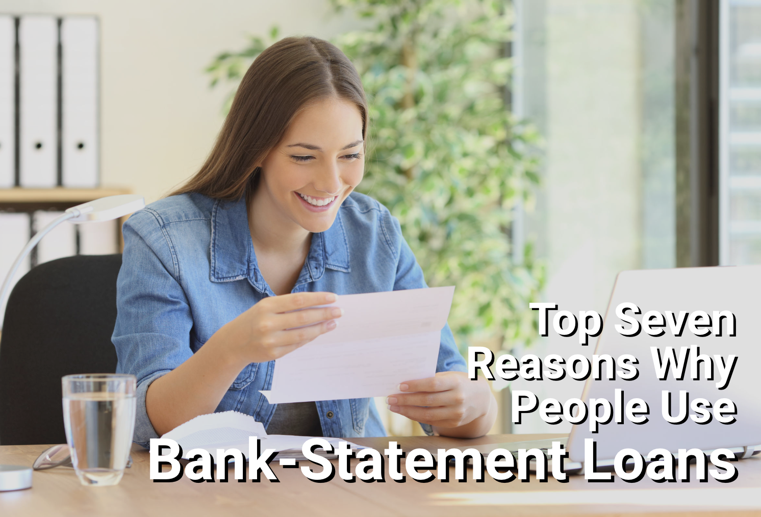 Woman looking at bank statement and smiling