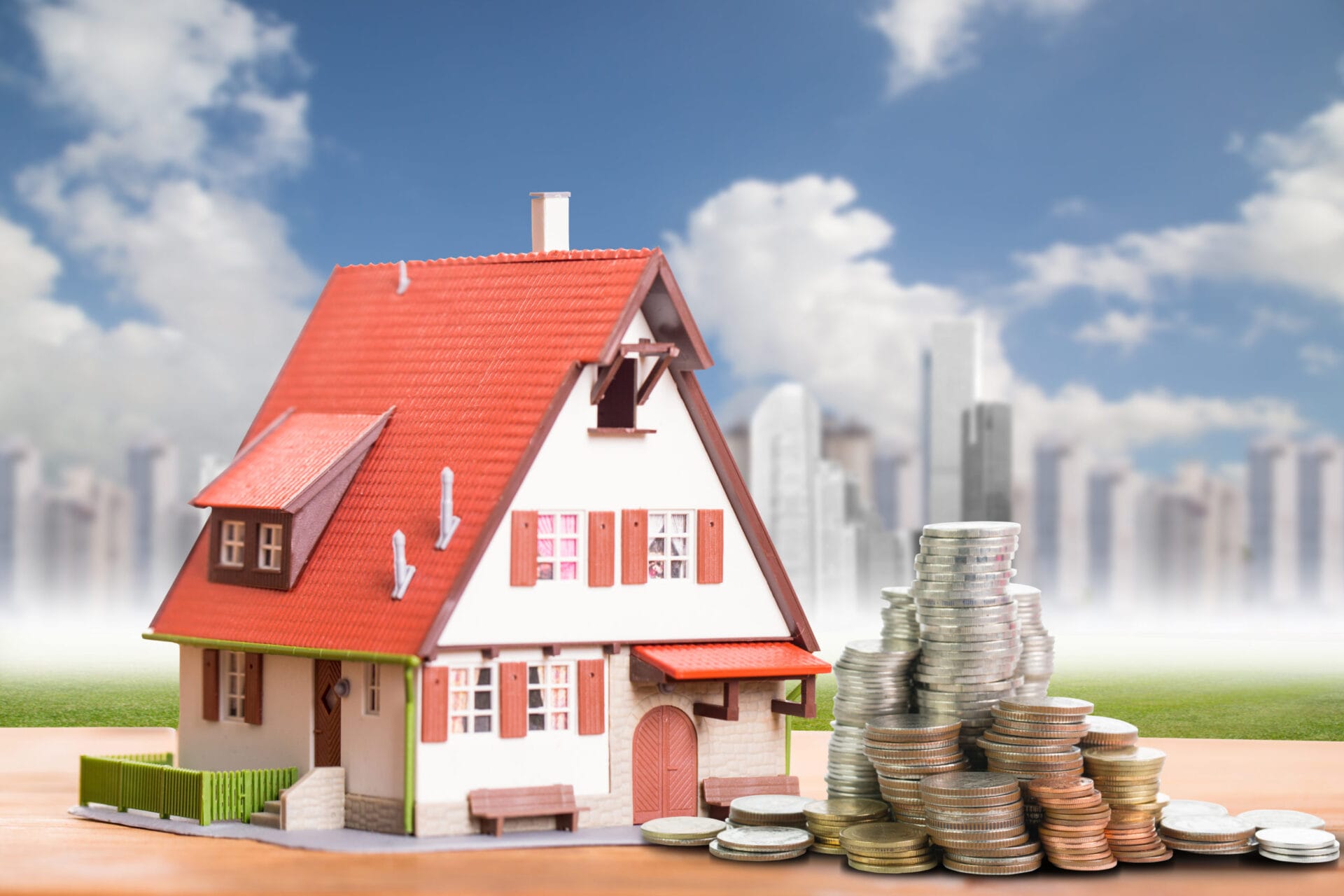 Toy house with money. Investment concept